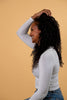 Gold Butter leave-in moisturiser for curly and coily hair, 3-in-1 formula to hydrate, detangle and define.