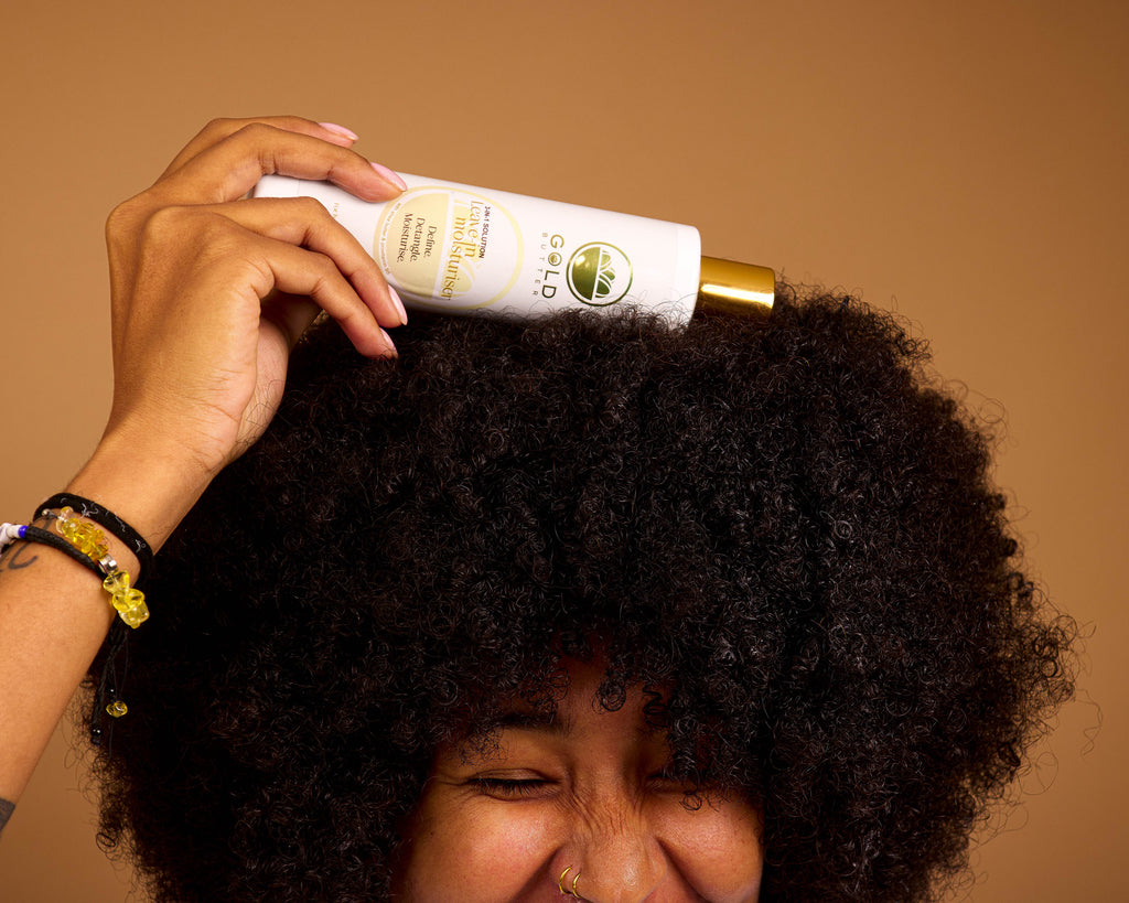 Gold Butter leave-in moisturiser for curly and coily hair, 3-in-1 formula to hydrate, detangle and define.